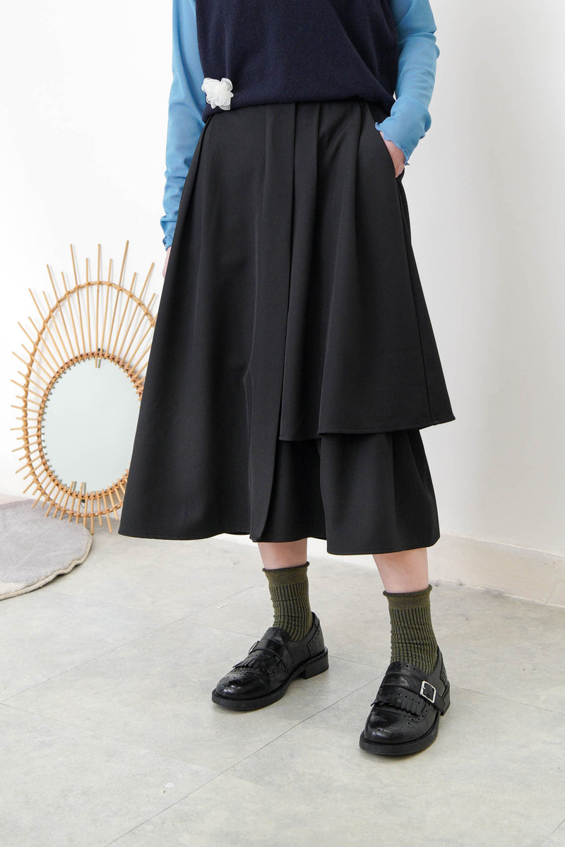 Black A cut skirt in detail cut out layering