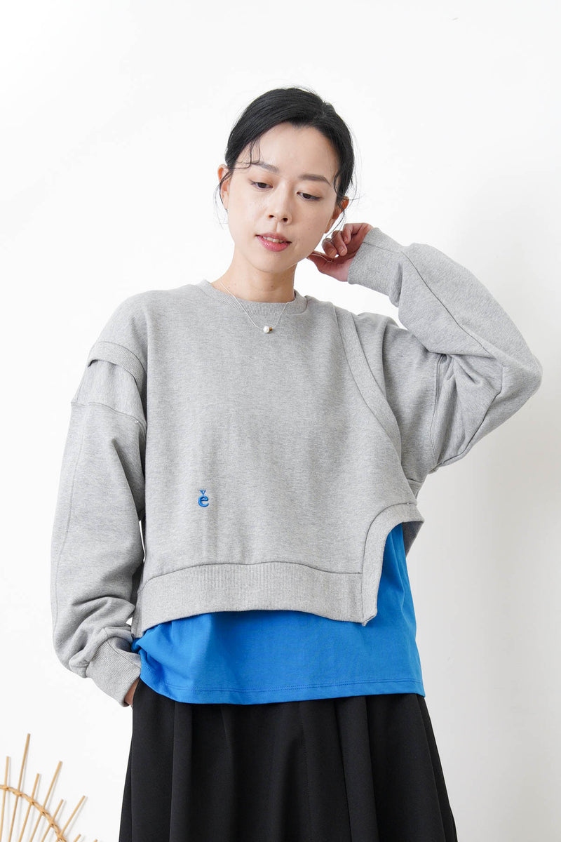 Grey pullover in asymmetrical 3D cut