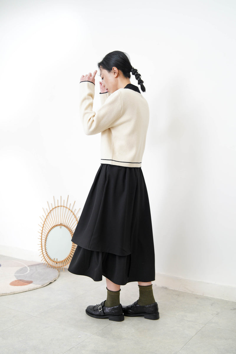 Black A cut skirt in detail cut out layering