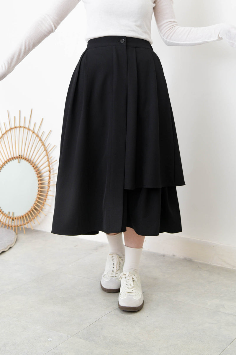 Black A cut skirt in detail cut out layering
