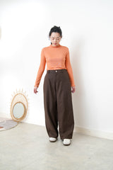 Dark brown cone shaped trousers in elastic waistband