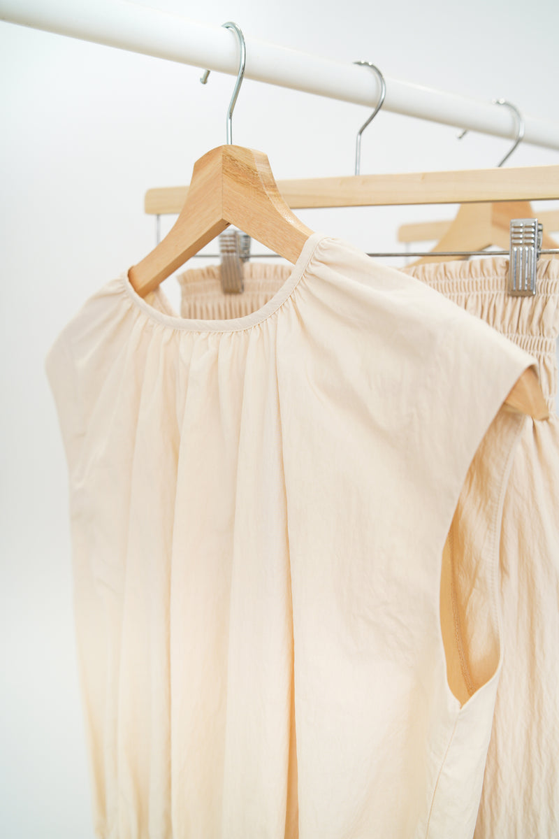 Pastel peach vest in elastic waist