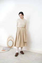 Beige pattern knit tip w/ ruffle fringe