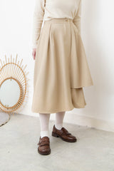 Beige A cut skirt in detail cut out layering