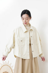 Beige pattern knit tip w/ ruffle fringe