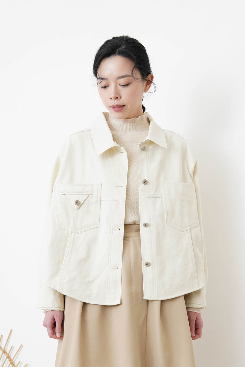 Beige pattern knit tip w/ ruffle fringe