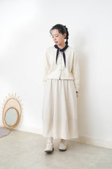White knit cardigan w/ knot tie collar