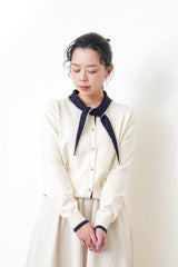 White knit cardigan w/ knot tie collar
