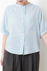 Blue shirt w/ detail pleats buttons