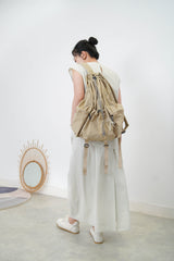 Beige drawstring backpack