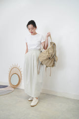 Beige drawstring backpack