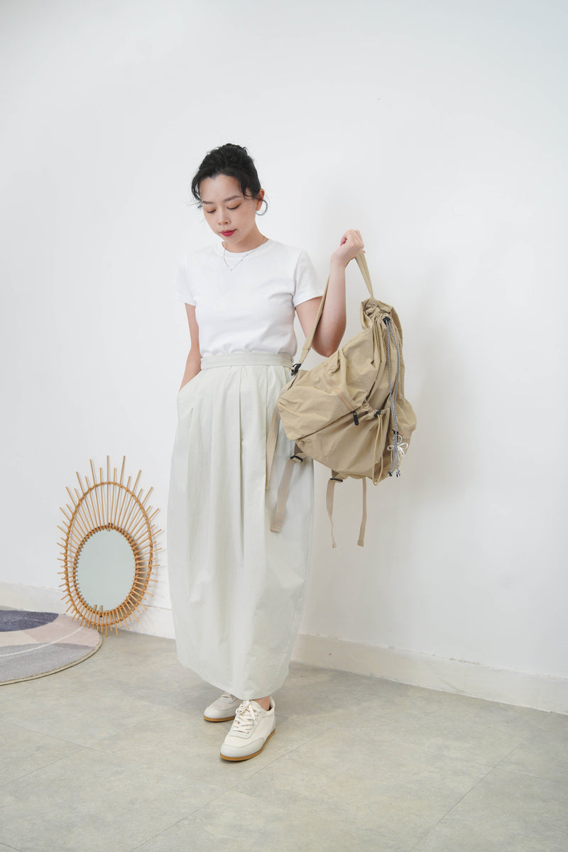 Beige drawstring backpack