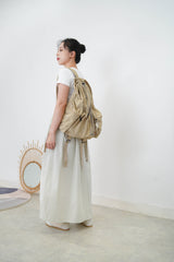 Beige drawstring backpack