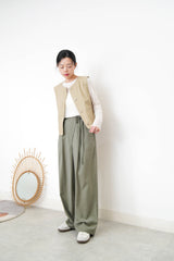 Beige pocket vest in worker style