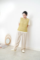 Yellow crochet vest