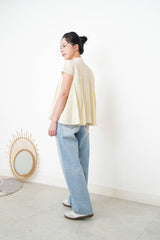 Yellow blouse in lace round neck
