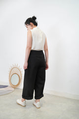 Ivory high neck blouse in pleats shoulders
