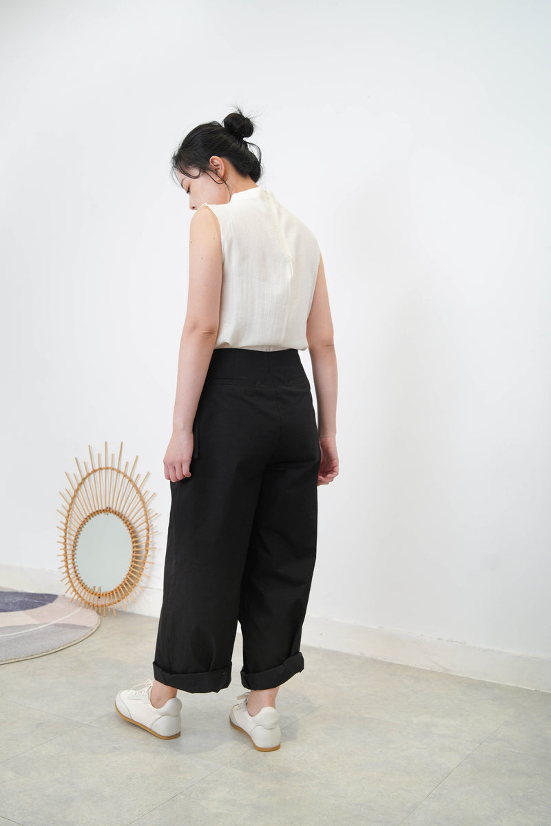 Ivory high neck blouse in pleats shoulders