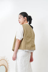 Beige vest w/ lace outlined details