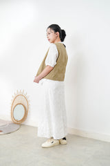 Beige vest w/ lace outlined details