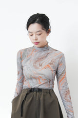 Green marble print turtle neck top