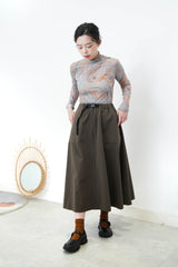 Green marble print turtle neck top