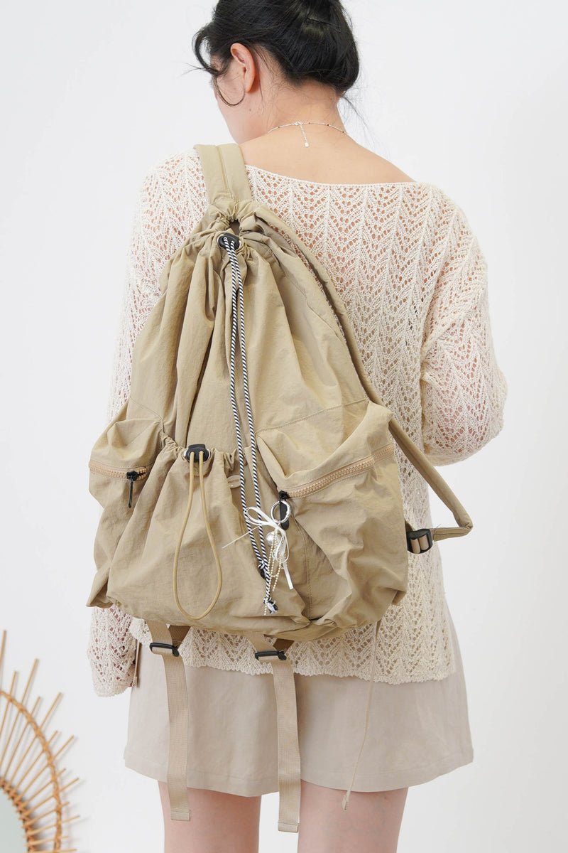 Beige crochet top in split hem