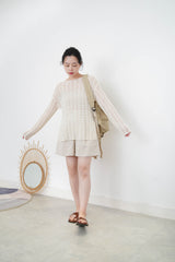 Beige crochet top in split hem