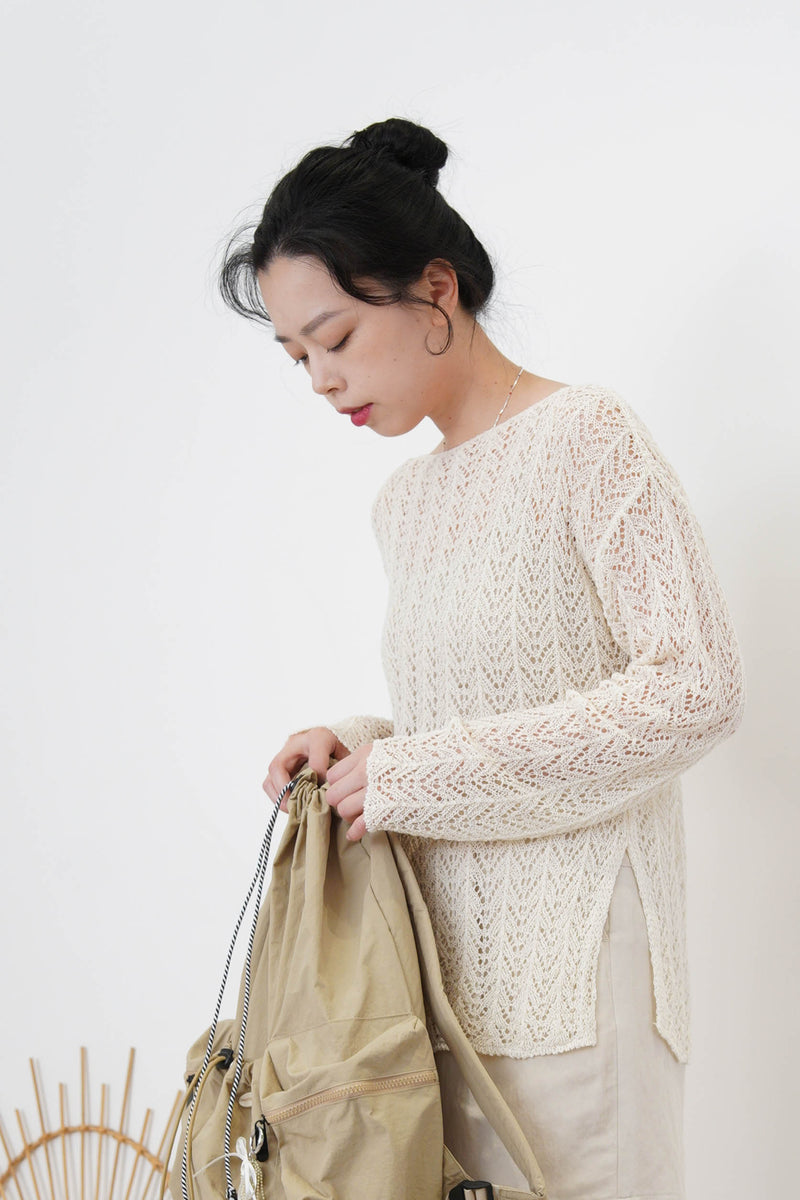 Beige crochet top in split hem