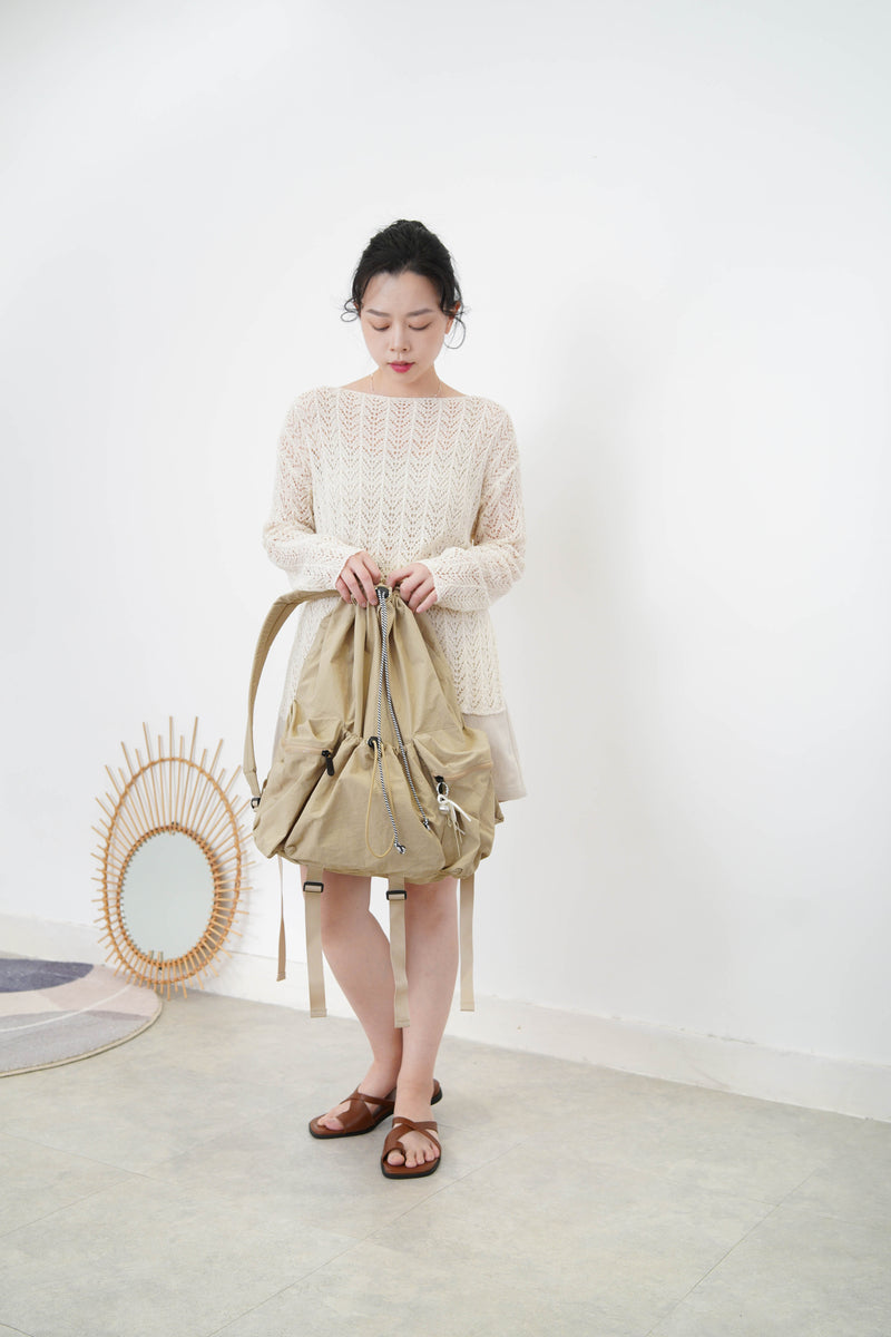 Beige crochet top in split hem
