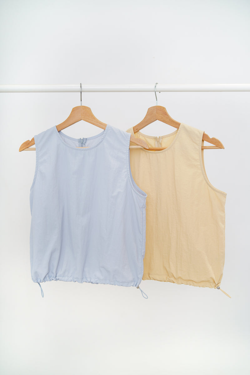 Yellow vest in drawstring waist