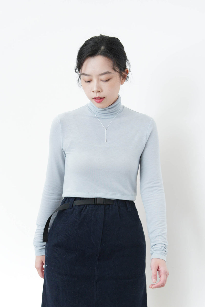 Sky blue turtle neck top in split hem