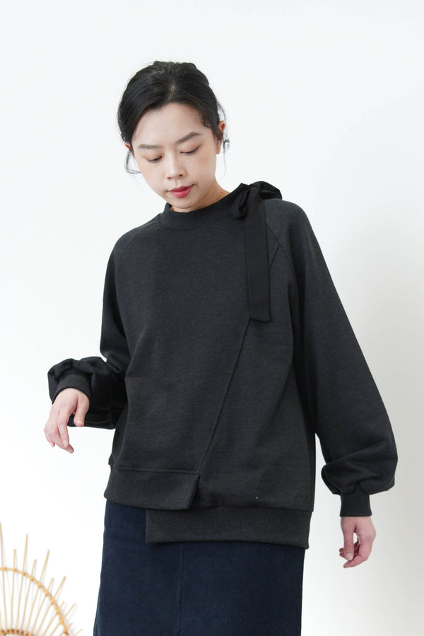 Black assy. Hem pullover w/ ribbon detail