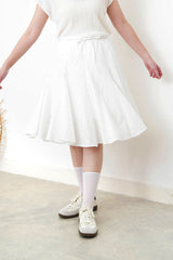 White A line peplum skirt w/ embroidery