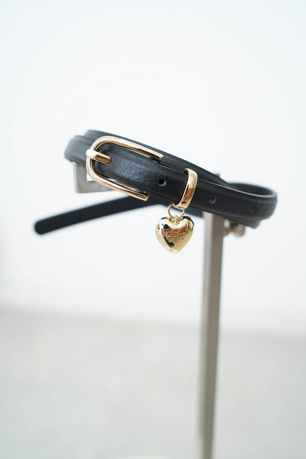 Leather belt with heart pendant