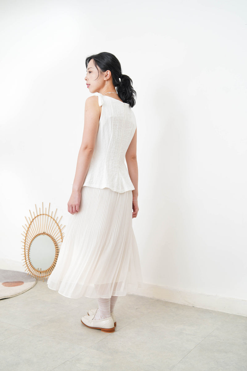 White boat neck premium vest w/ ribbon details