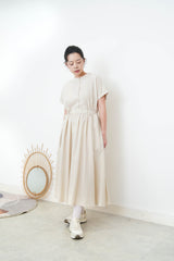 Beige one piece w/ waist string