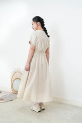 Beige one piece w/ waist string