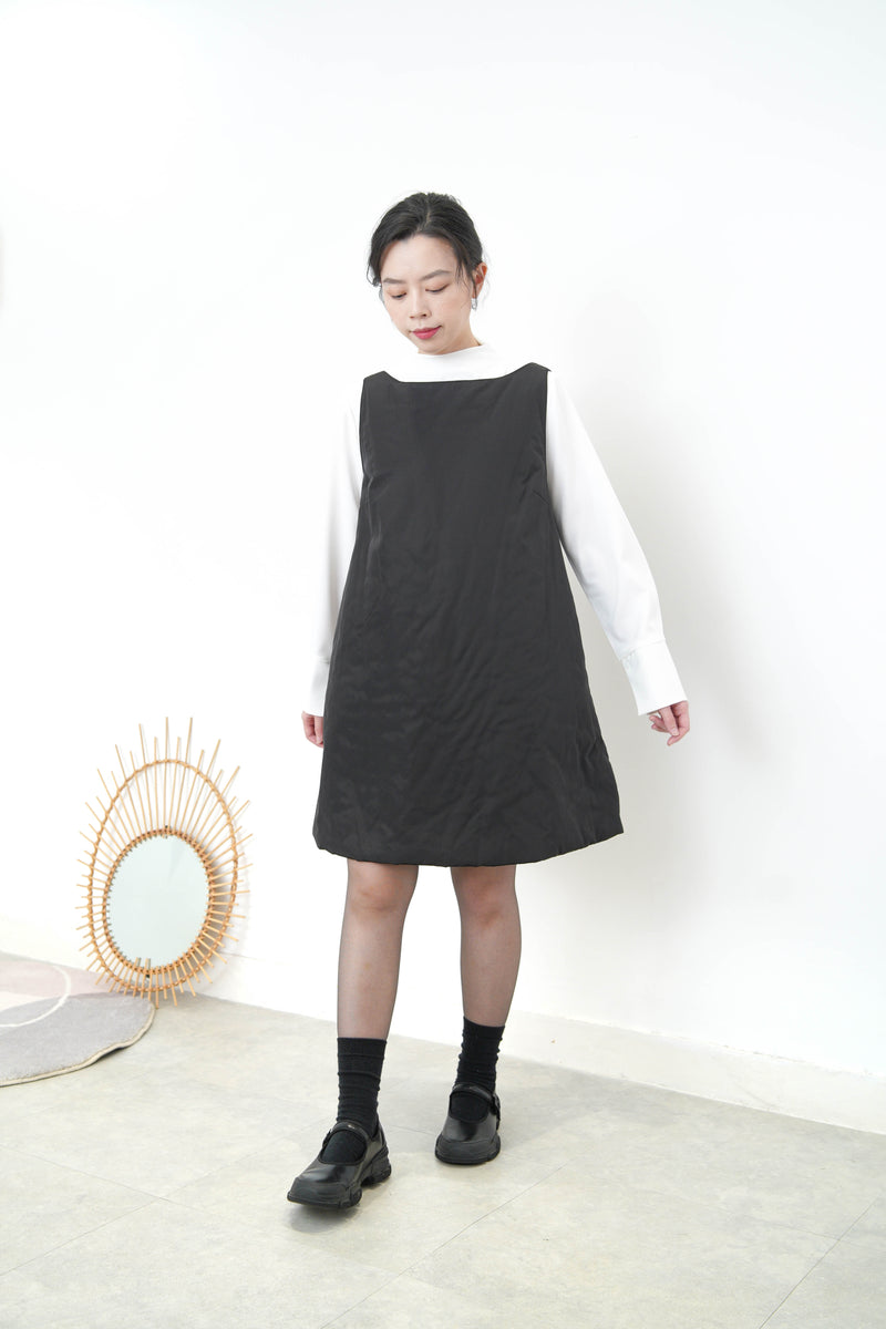 Little black dress in padded fabric