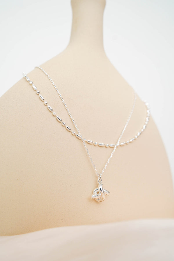 Chain necklace w/ long knot necklace in set