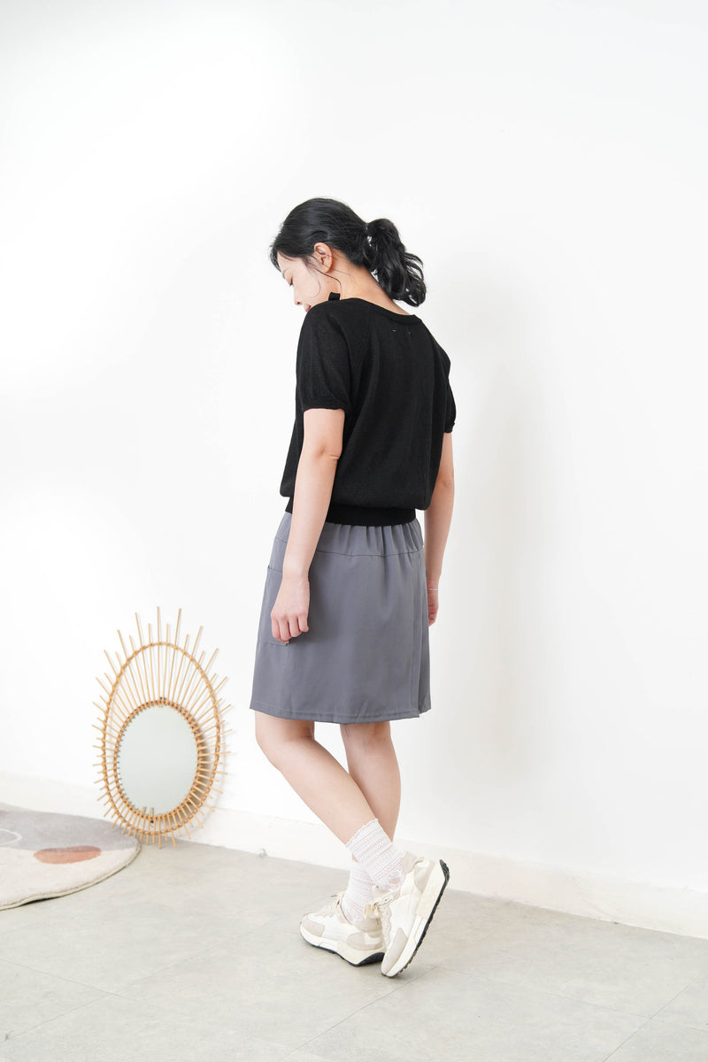 Black knit top w/ ribbon collar details