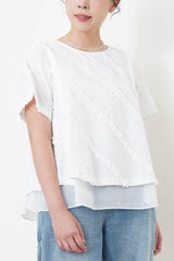 White double layering flare blouse in ruffles details