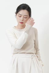Duo tone knit top in asy. pattern
