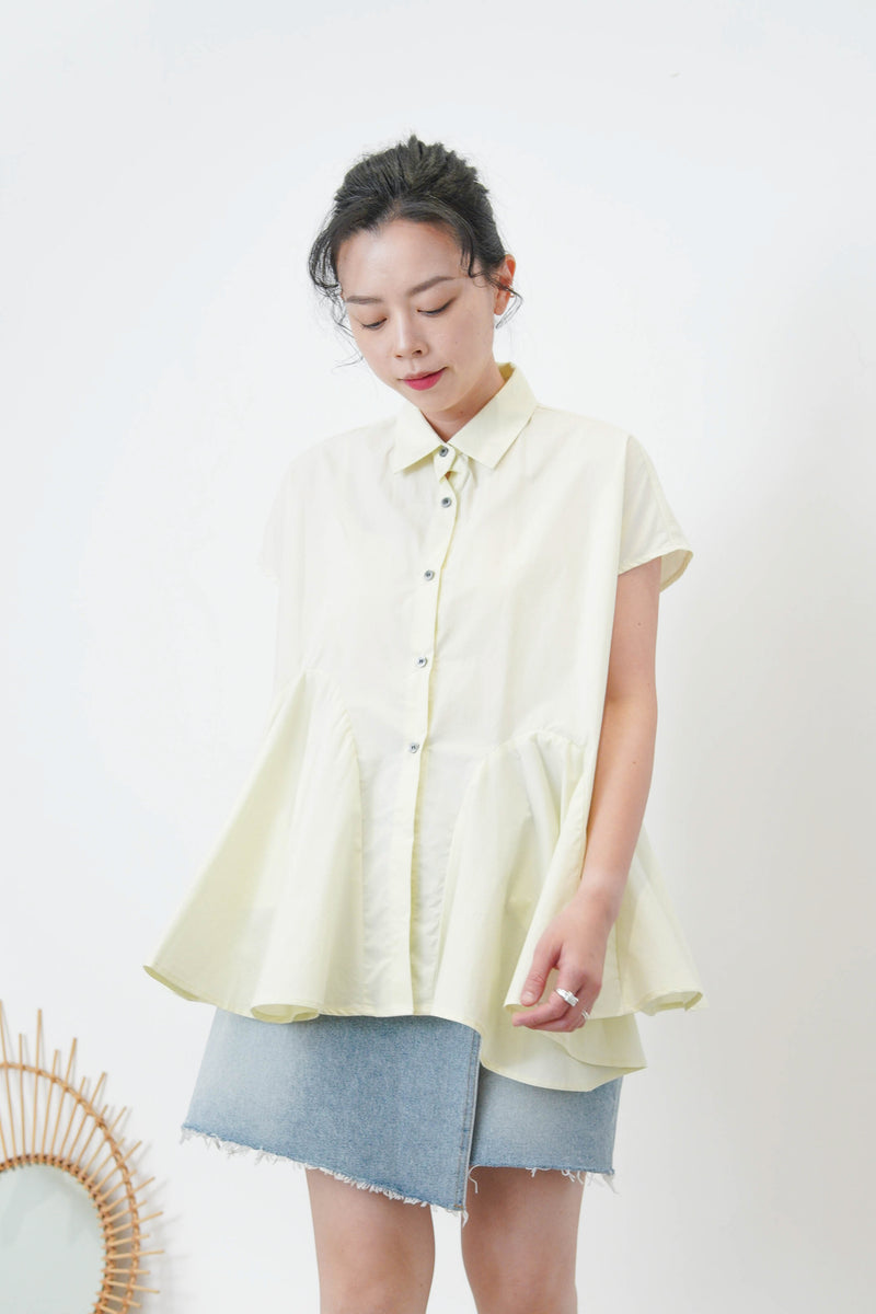 White shirt w/ peplum hem details
