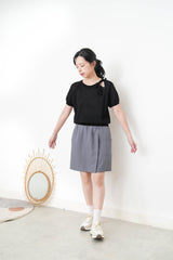 Black knit top w/ ribbon collar details