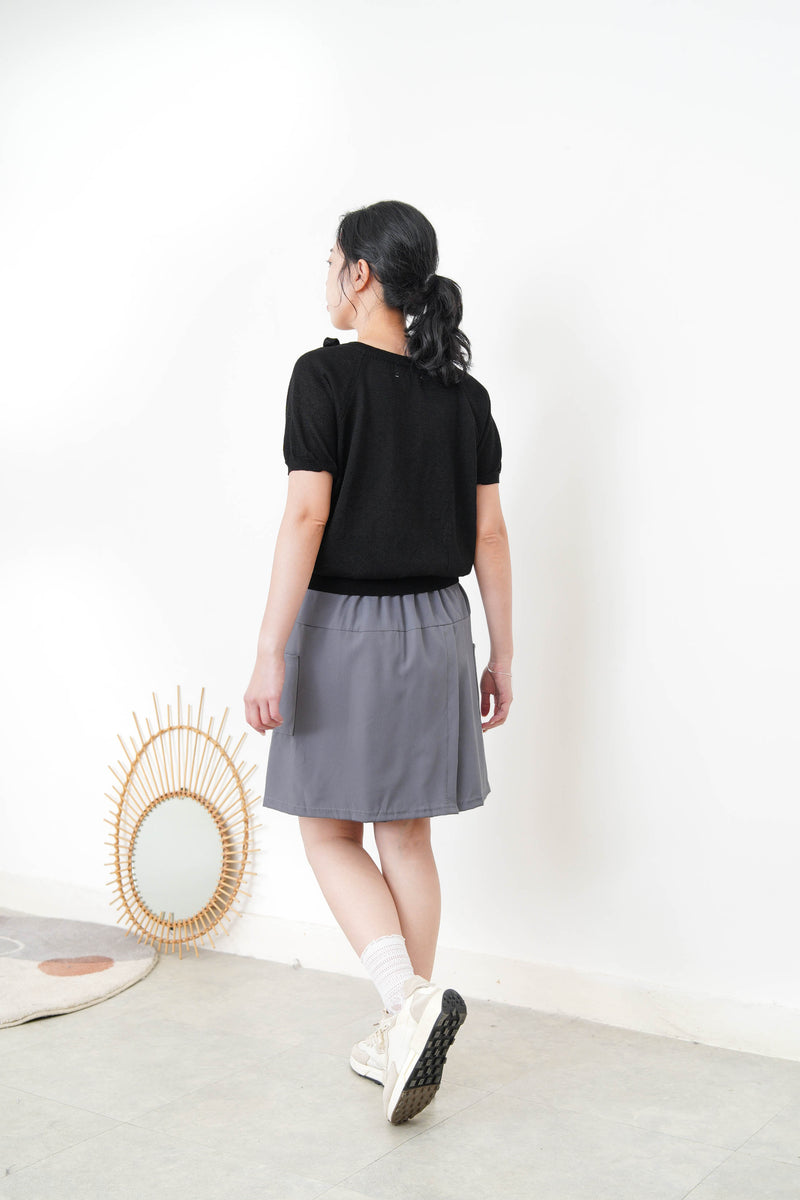 Black knit top w/ ribbon collar details