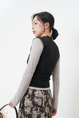 Black 3D asymmetrical vest w/ cut out detail