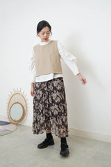 Beige vest w/ badge
