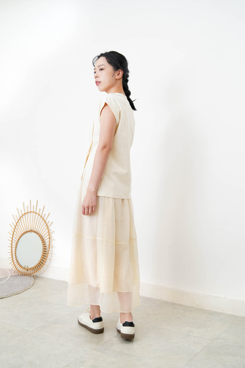 Cream split hem vest w/ gather waist details