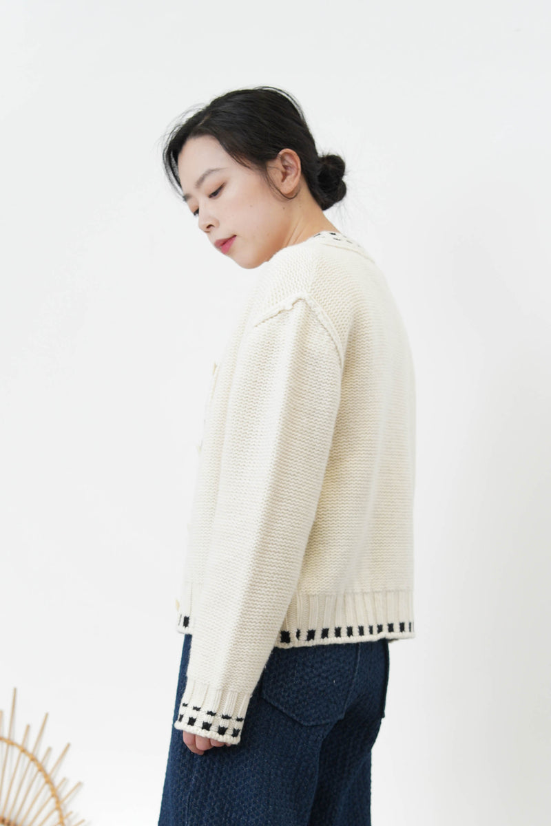 Ivory 100% wool cardigan in outline stitching